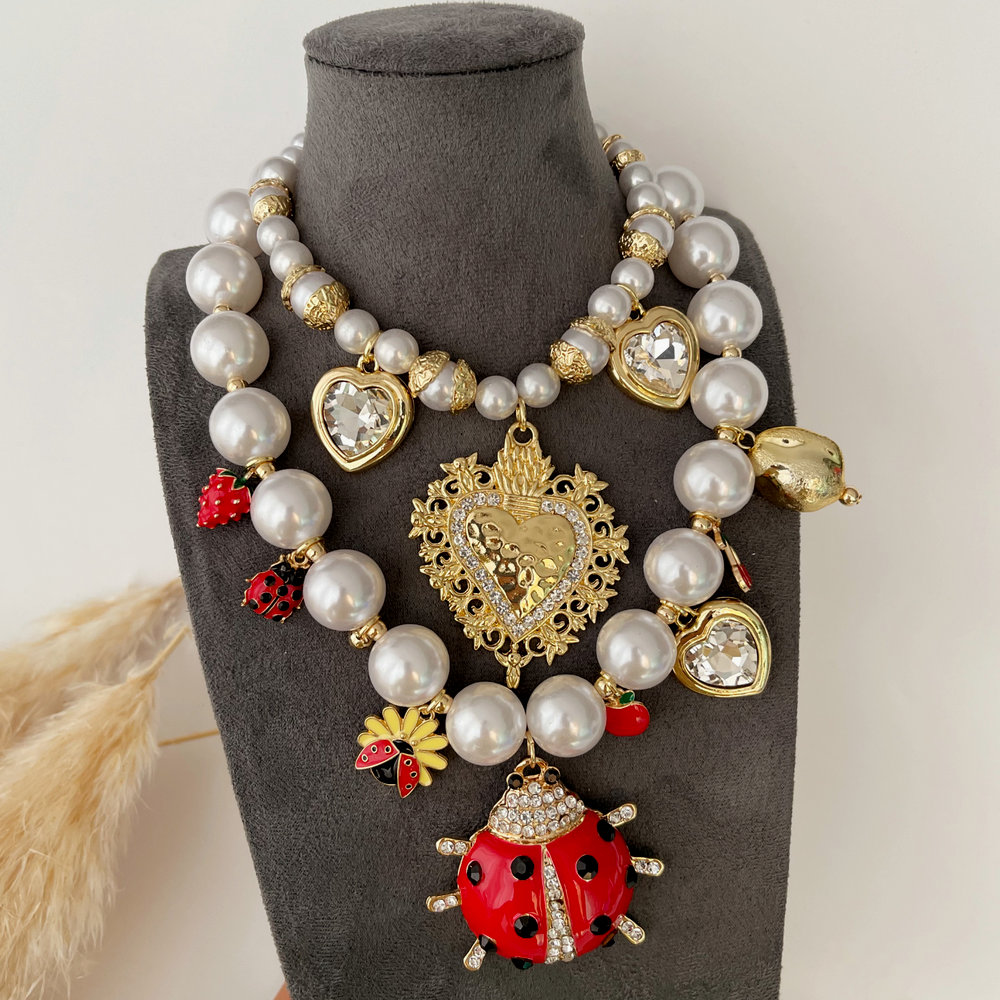Chunky glass pearl necklace with ladybag