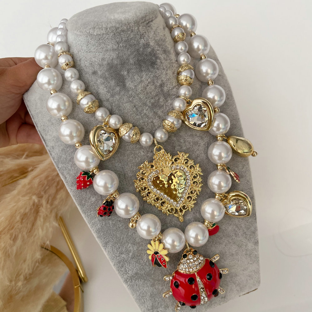 Chunky glass pearl necklace with ladybag