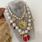 Chunky glass pearl necklace with ladybag