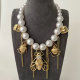 Glass pearl bee charm necklace