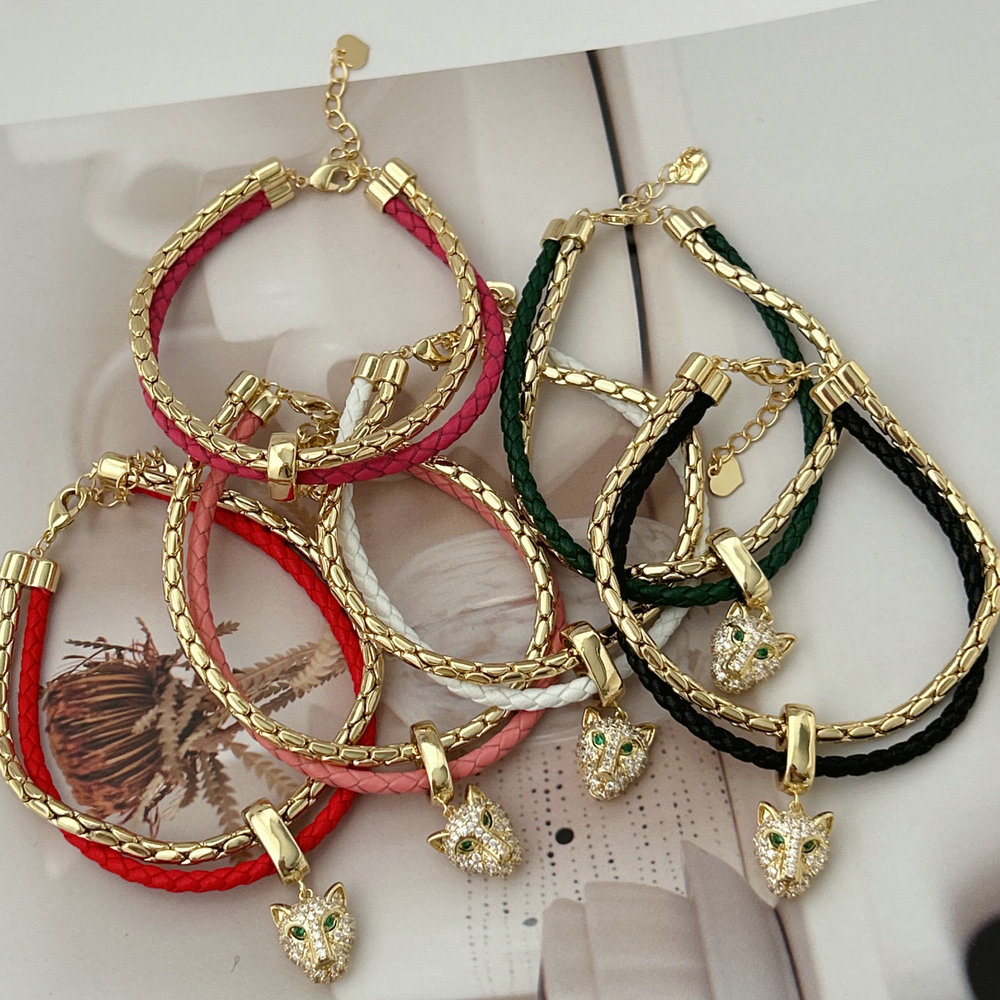 leather bracelet with lion charm