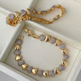 Pave zircon two tone heart bracelet