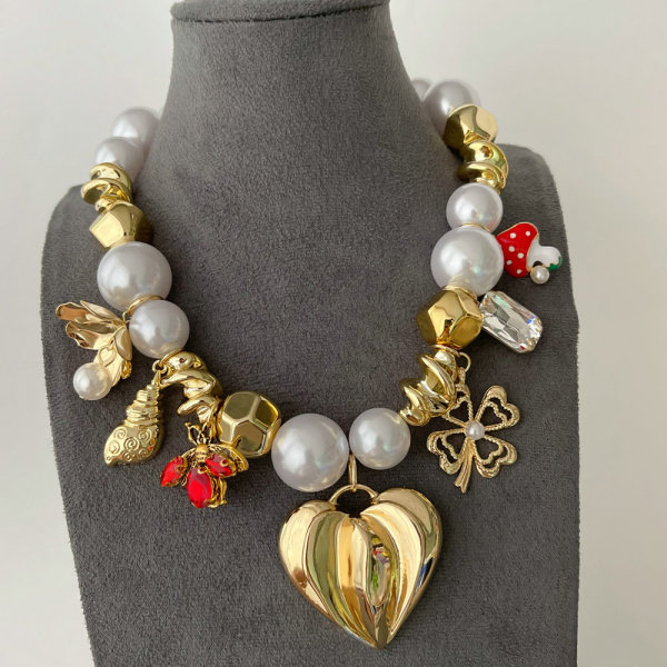Glass pearl heart charm necklace