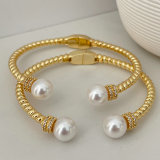 Twist pearl bangle