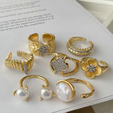 Two tone star clover ring