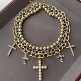 layer bead cross necklace