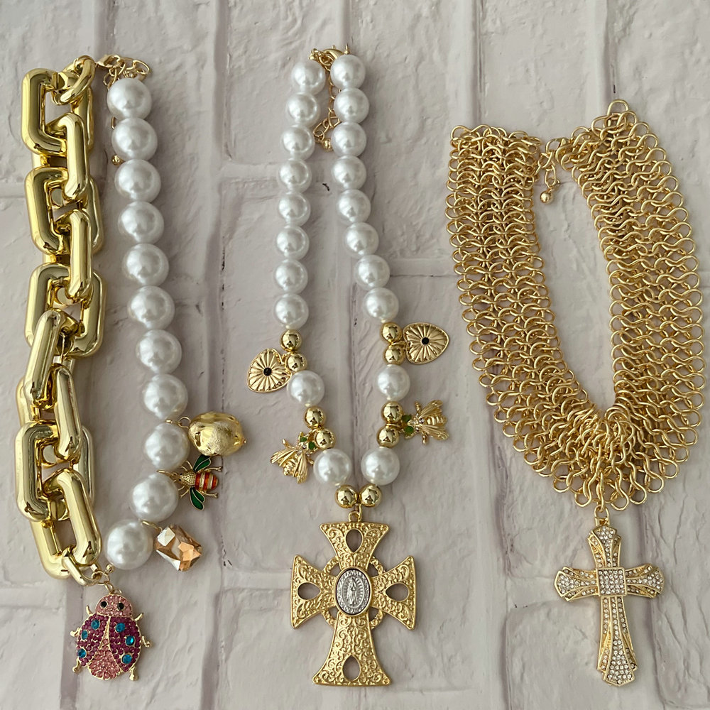 Chunky necklace with ladybug charm cross pendant