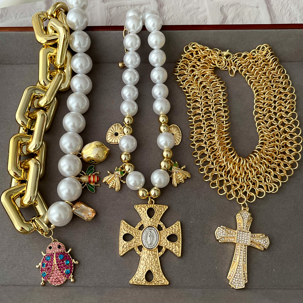 Chunky necklace with ladybug charm cross pendant