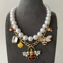 Bee charm necklace