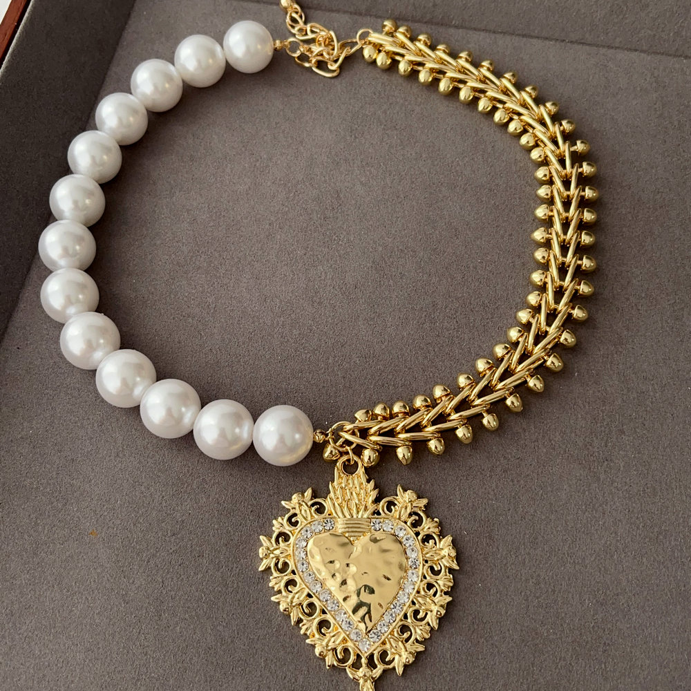 Half pearl half chain necklace with heart pendant