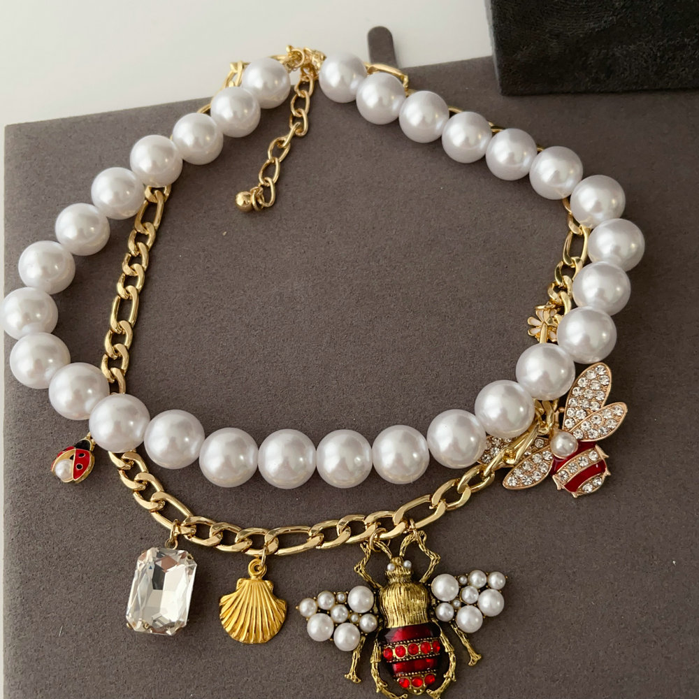 Bee charm necklace