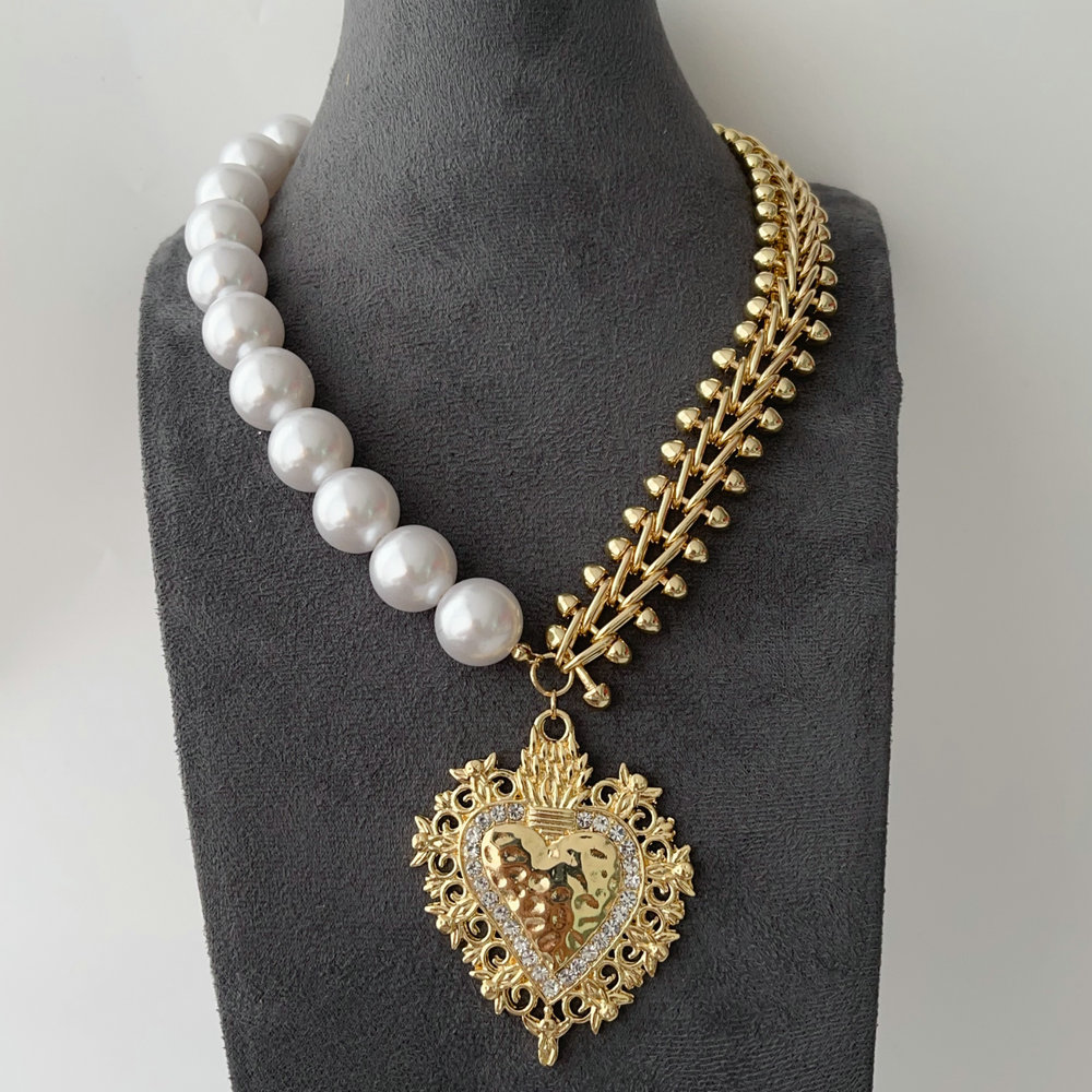 Half pearl half chain necklace with heart pendant