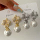 Pave zircon flower pearl earrings