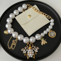 Bee charm necklace