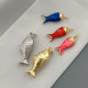 Enamel fish charm