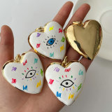 Enamel heart eye pendant