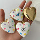 Enamel heart eye pendant