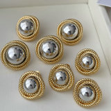 Two tone twist flower earrings
