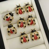 Pave ladybug earrings