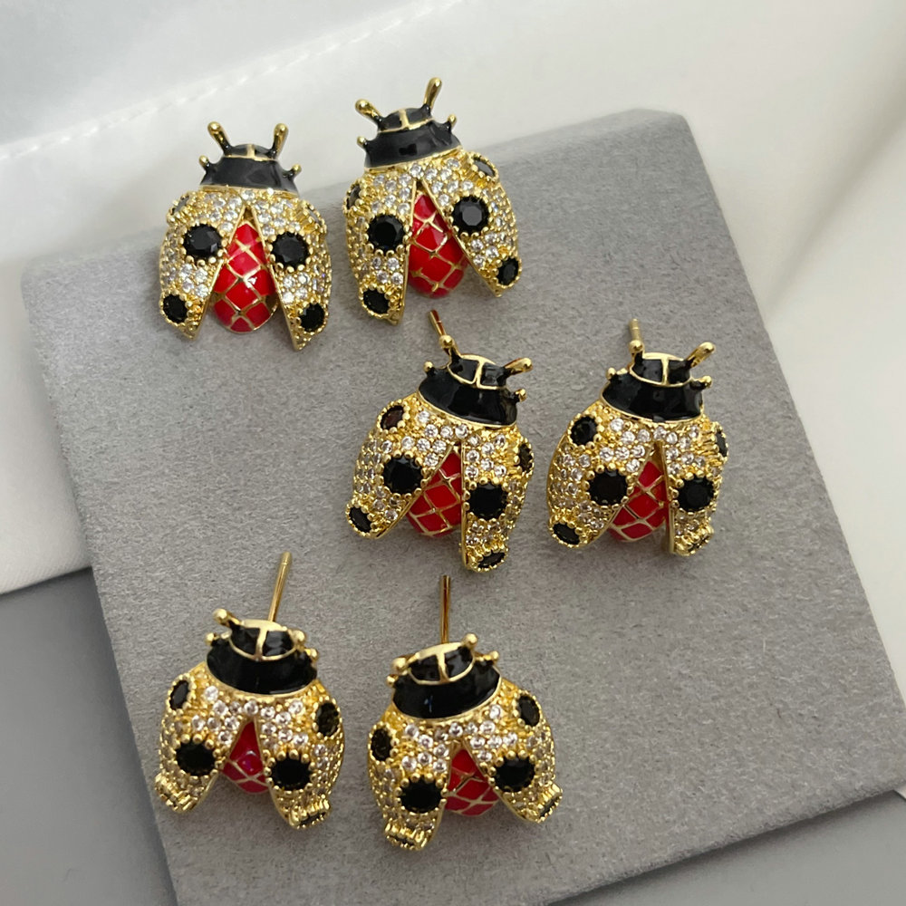 Pave ladybug earrings