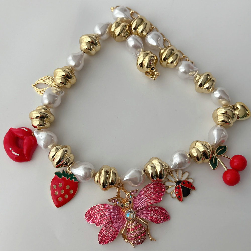 Pink butterfly charm necklace