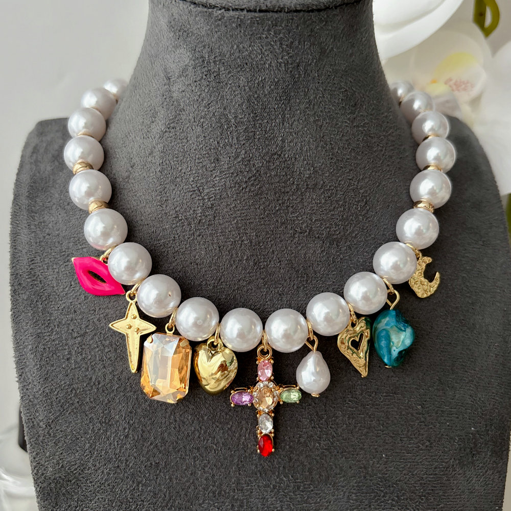 Glass pearl cross pendant necklace