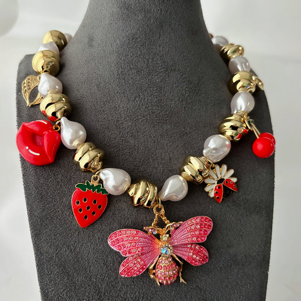 Pink butterfly charm necklace