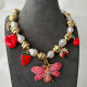 Pink butterfly charm necklace