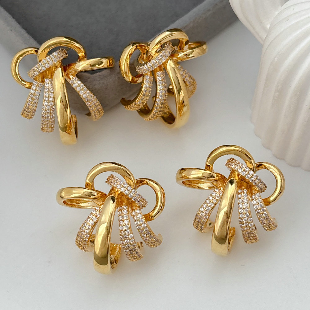 Pave twist flower earrings