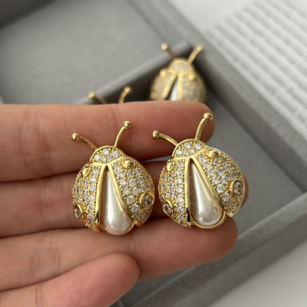 Pave ladybug earrings