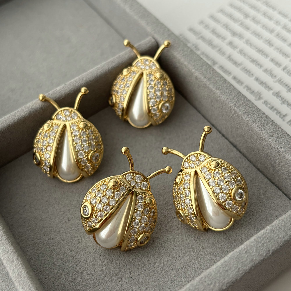 Pave ladybug earrings