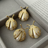 Pave ladybug earrings