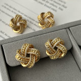 Pave knot flower earrings