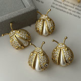 Pave ladybug earrings
