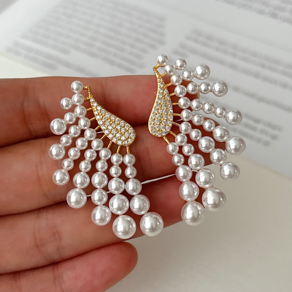 Pearl wing earrings