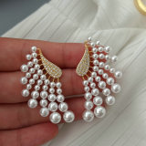 Pearl wing earrings