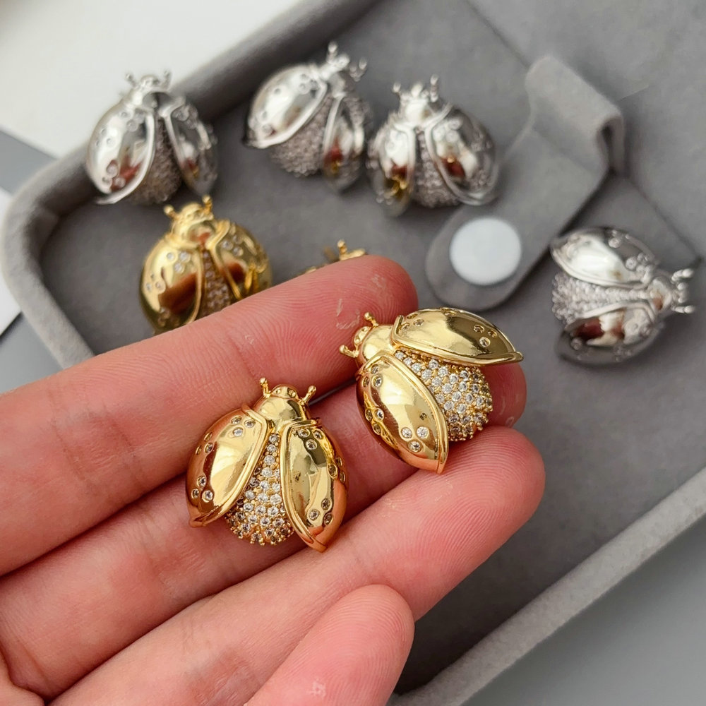 Pave ladybug earrings