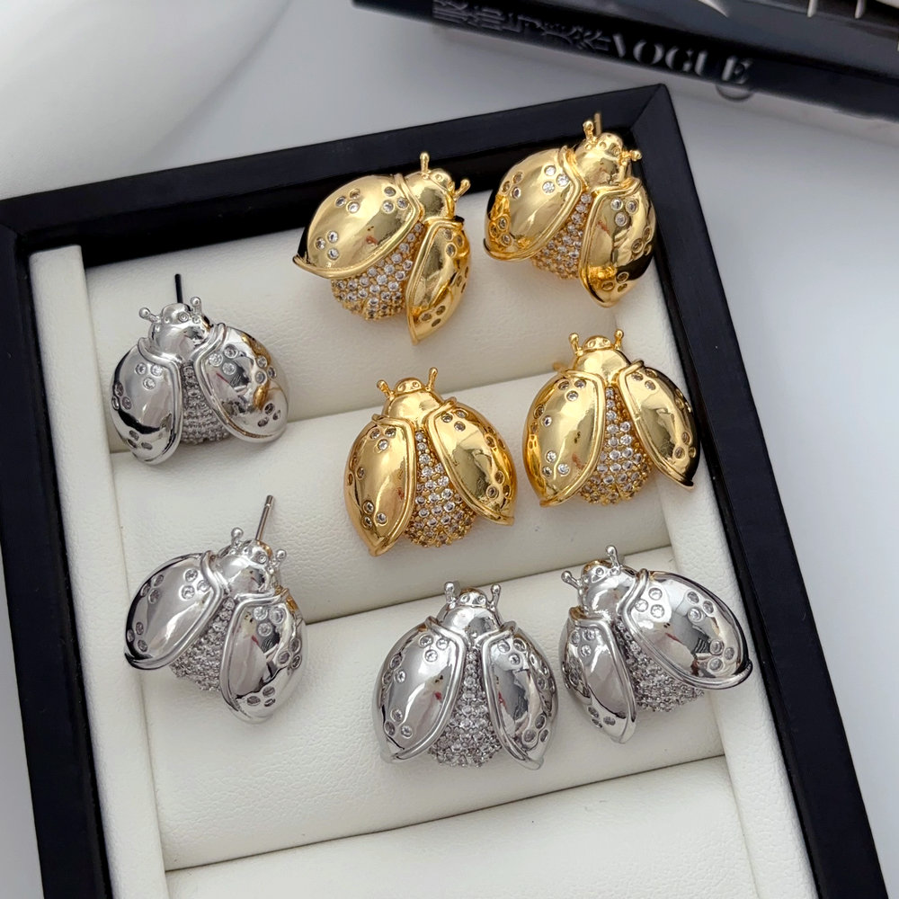 Pave ladybug earrings
