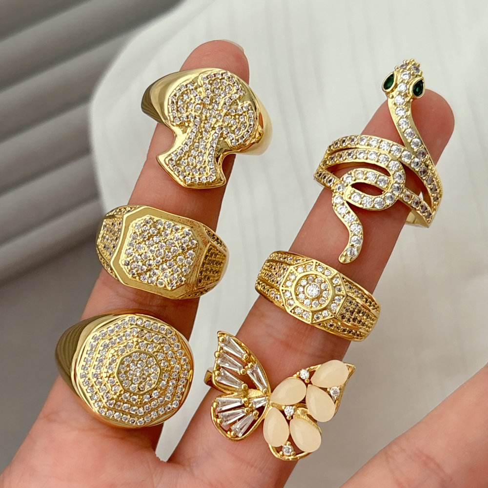 Pave corss snake ring