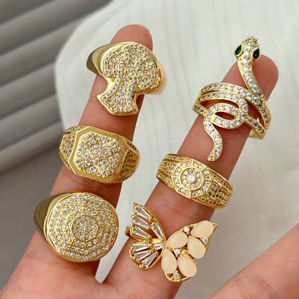 Pave corss snake ring