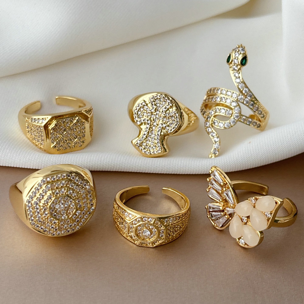 Pave corss snake ring