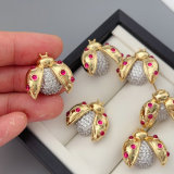 Pave zircon ladybug earrings