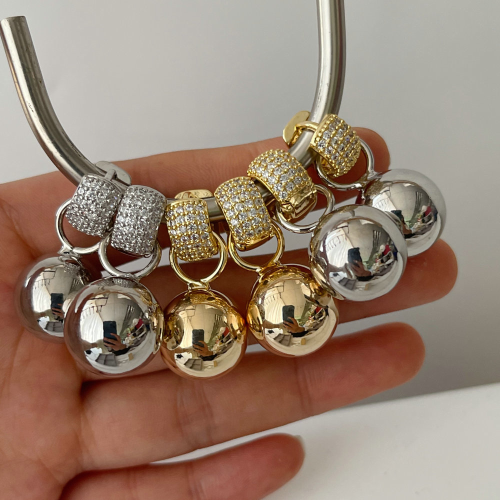 Ball charm earrings
