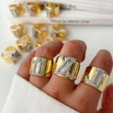 Two tone pave letter ring