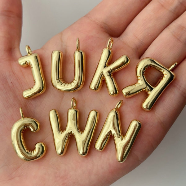 Metal letter charm