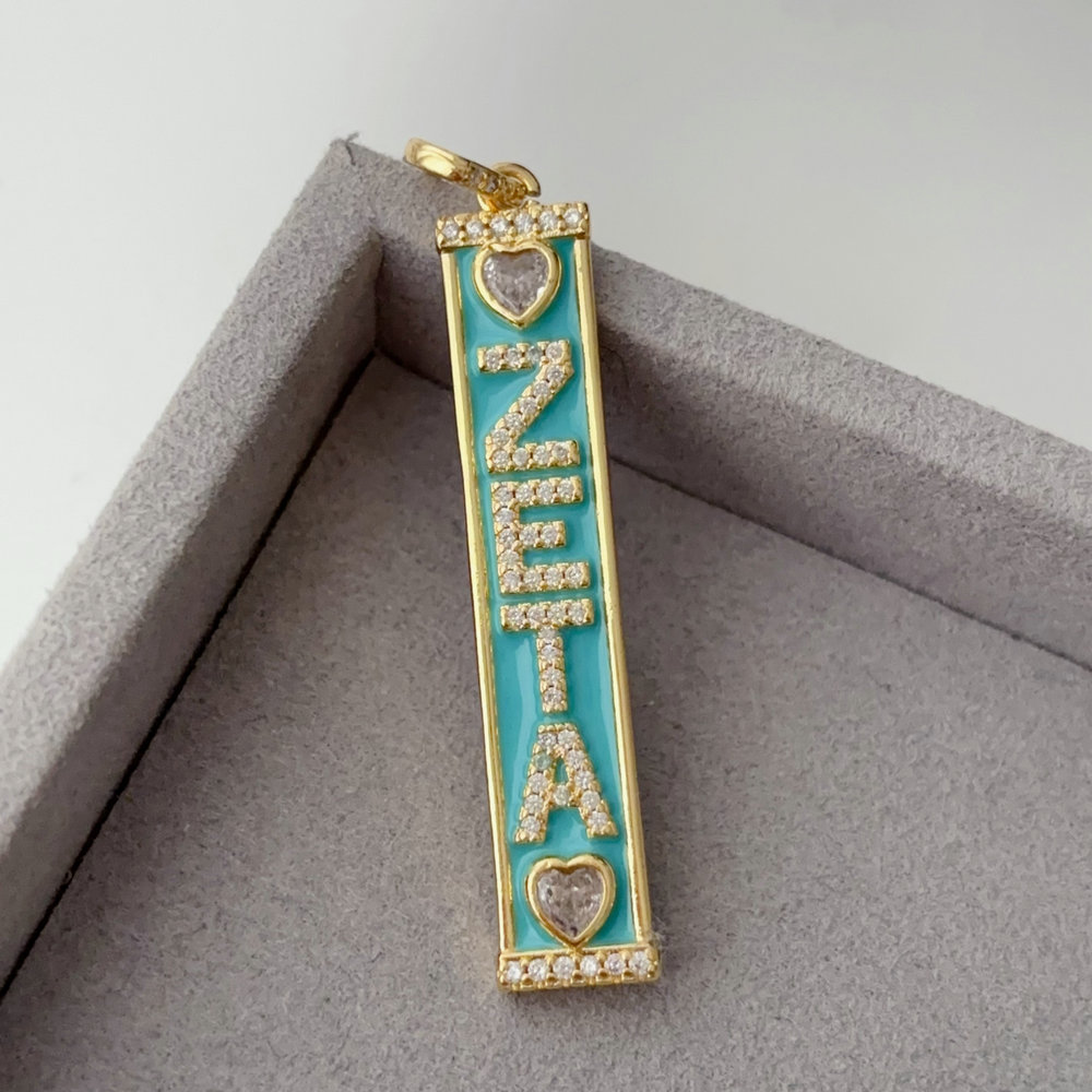 Enamel zeta bar charm