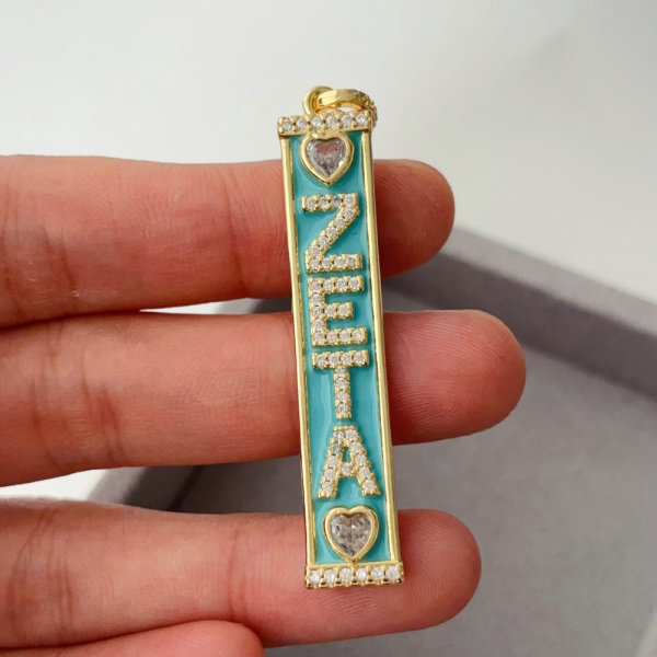 Enamel zeta bar charm