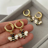 Bee charm earrings