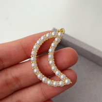 Pearl moon charm