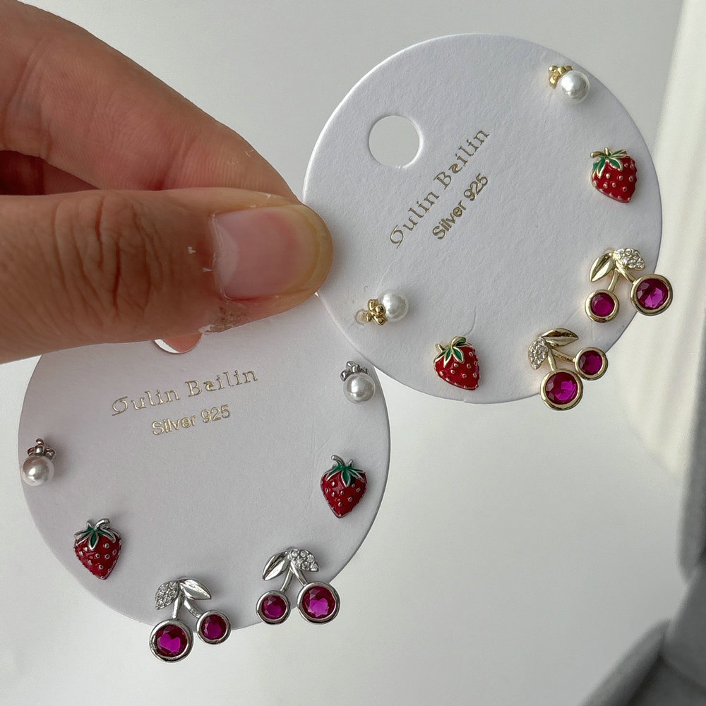 Set cherry charm earrings